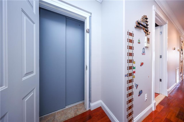 2679 E 24th St Unit 1B, Brooklyn, NY 11235 - hall with elevator, wood finished floors, and baseboards