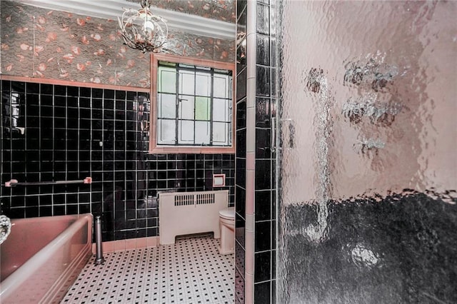 8044 Narrows Ave, Brooklyn, NY 11209 - bathroom featuring tile walls, a bathtub, a shower, and radiator
