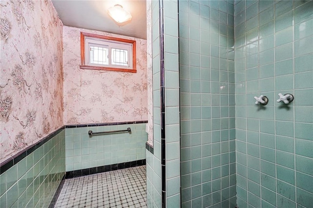 8044 Narrows Ave, Brooklyn, NY 11209 - full bath with wallpapered walls, wainscoting, a tile shower, and tile walls