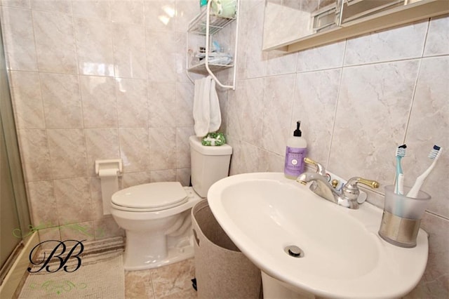2070 Pearson St, Brooklyn, NY 11234 - bathroom with a sink, toilet, tile walls, and a shower with door