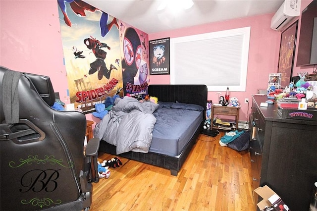 2070 Pearson St, Brooklyn, NY 11234 - bedroom featuring a wall mounted AC, wood finished floors, and ceiling fan