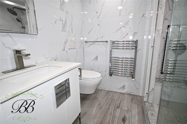 2070 Pearson St, Brooklyn, NY 11234 - full bath featuring radiator, a marble finish shower, a towel warmer, tile walls, and toilet