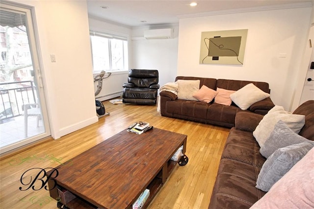 2070 Pearson St, Brooklyn, NY 11234 - living room featuring a baseboard heating unit, a wall mounted AC, wood finished floors, crown molding, and recessed lighting