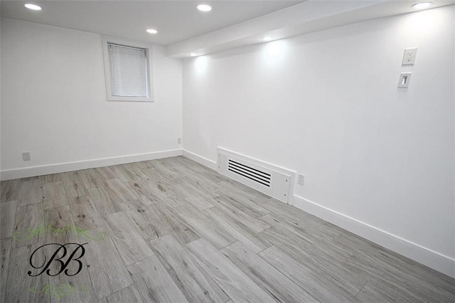 2070 Pearson St, Brooklyn, NY 11234 - finished below grade area featuring recessed lighting, wood finished floors, and baseboards