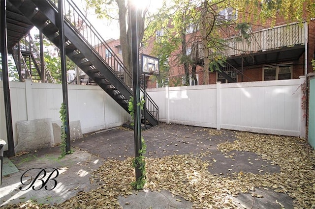 2070 Pearson St, Brooklyn, NY 11234 - view of patio featuring stairway and fence