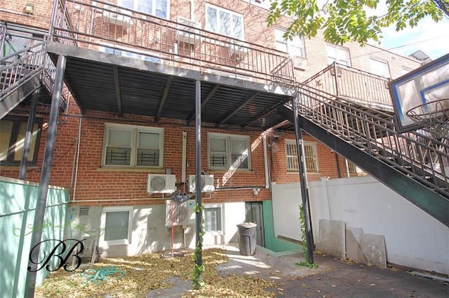 2070 Pearson St, Brooklyn, NY 11234 - back of property with brick siding, stairs, and a cooling unit