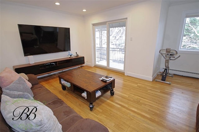 2070 Pearson St, Brooklyn, NY 11234 - living room with wood finished floors, crown molding, baseboards, recessed lighting, and a baseboard heating unit