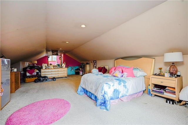 bedroom with carpet and lofted ceiling