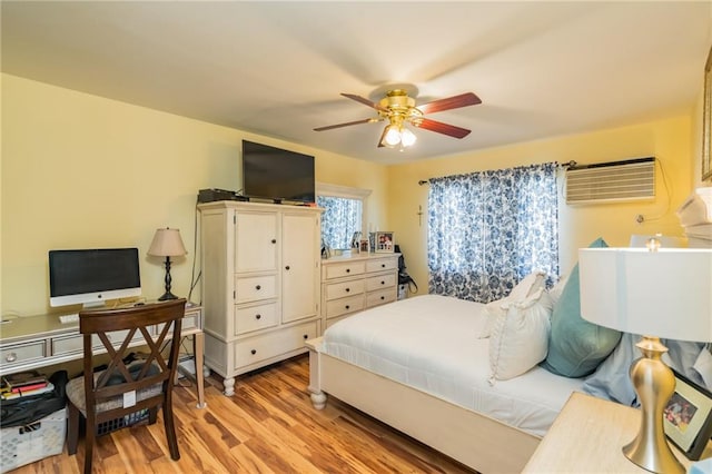 bedroom featuring light wood finished floors and ceiling fan