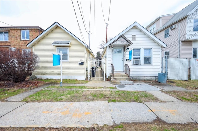 480 Midland Ave, Staten Island, NY 10306 - view of front of home with entry steps, cooling unit, and a gate