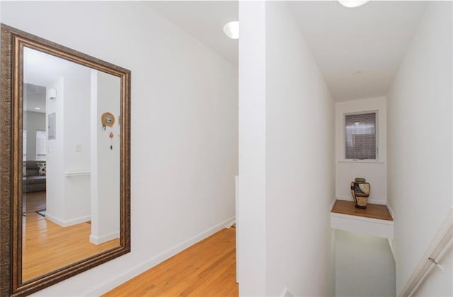 2841 Ford St Unit 1R, Brooklyn, NY 11235 - hallway featuring light wood finished floors and baseboards