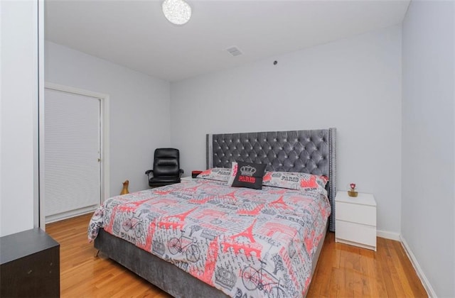 2841 Ford St Unit 1R, Brooklyn, NY 11235 - bedroom featuring wood finished floors and baseboards