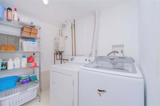 2841 Ford St Unit 1R, Brooklyn, NY 11235 - laundry area with washing machine and dryer, light tile patterned flooring, and tankless water heater