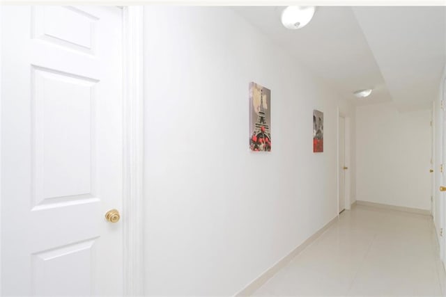 2841 Ford St Unit 1R, Brooklyn, NY 11235 - corridor with baseboards and light tile patterned floors