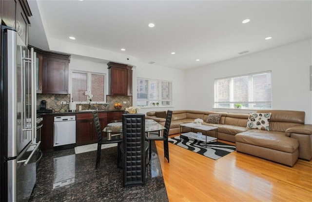 2841 Ford St Unit 1R, Brooklyn, NY 11235 - living area with recessed lighting and light wood finished floors