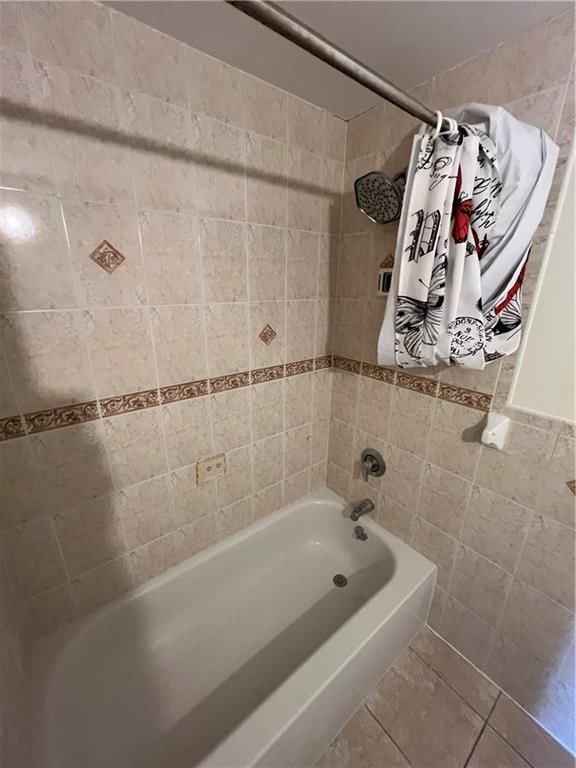 1391 Stanley Ave, East New York, NY 11208 - full bathroom featuring tile walls, shower / bathtub combination with curtain, and tile patterned floors