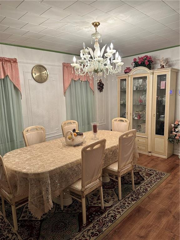 956 E 48th St, Brooklyn, NY 11203 - dining area featuring a chandelier and wood finished floors