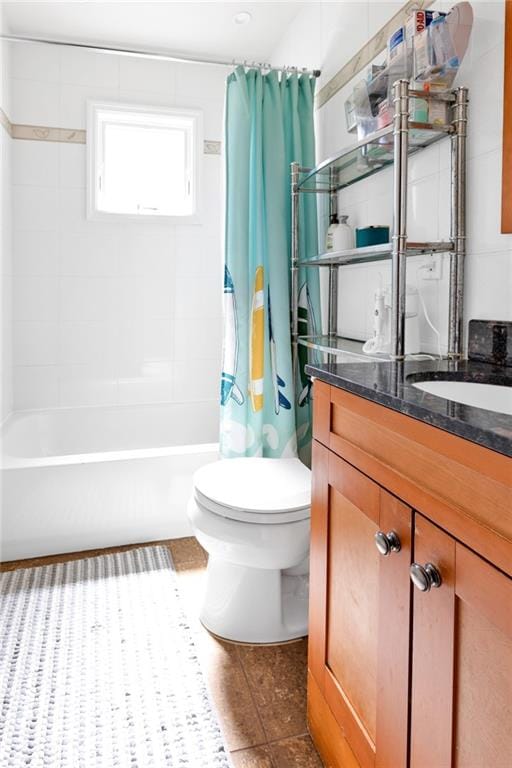 bathroom featuring shower / bath combo, toilet, tile patterned floors, and vanity