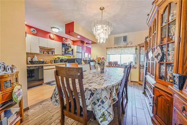 1655 72nd St, Brooklyn, NY 11204 - dining area featuring light wood-type flooring and a chandelier