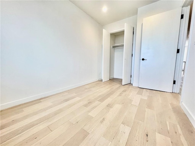 800 5th Ave Unit 4A, Brooklyn, NY 11232 - unfurnished bedroom with light wood-style flooring and baseboards