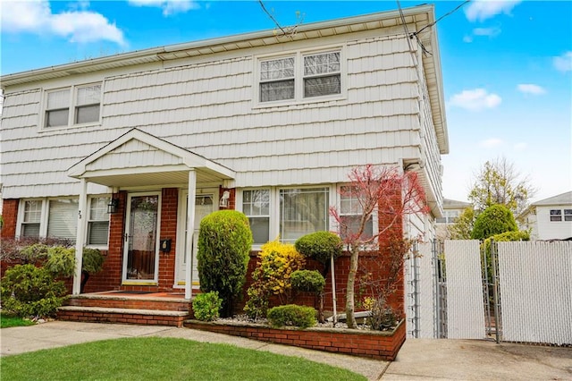 71 Abingdon Ave, Staten Island, NY 10308 - view of front of home featuring a gate and brick siding