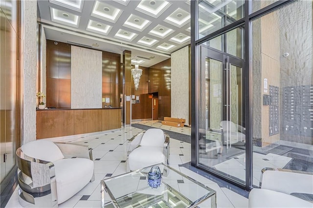 building lobby featuring coffered ceiling