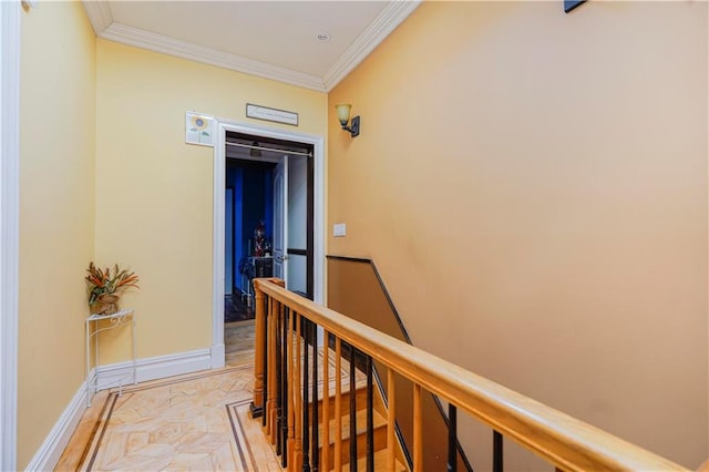 hallway with baseboards, an upstairs landing, and ornamental molding