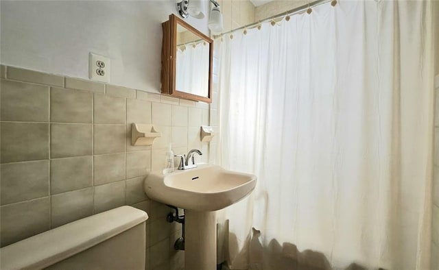 460 Ovington Ave Unit 3G, Brooklyn, NY 11209 - full bathroom featuring tile walls and a shower with shower curtain