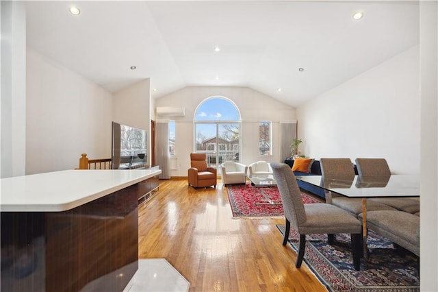 8719 Bay 16th St Unit 3A, Brooklyn, NY 11214 - dining area with light wood-type flooring, recessed lighting, high vaulted ceiling, and a wall mounted air conditioner