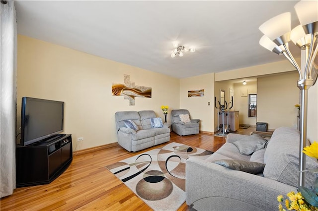 2260 Benson Ave Unit 5C, Brooklyn, NY 11214 - living room featuring baseboards and light wood-style flooring