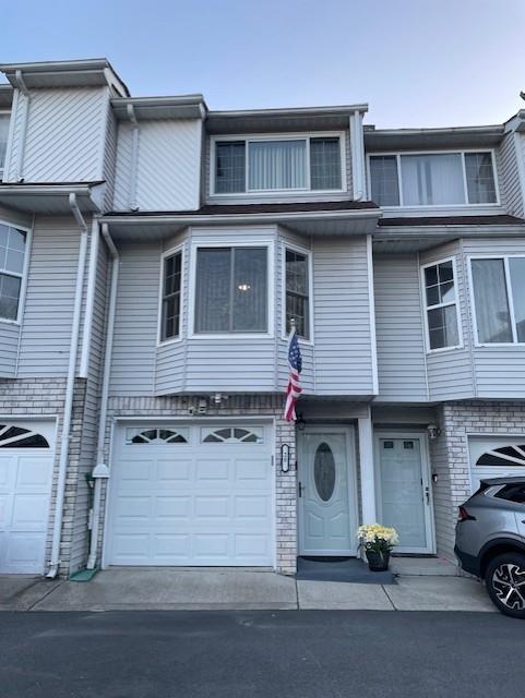 20 Linda Ln, Staten Island, NY 10312 - multi unit property featuring an attached garage