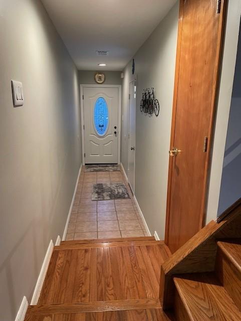 20 Linda Ln, Staten Island, NY 10312 - entryway with baseboards and tile patterned flooring