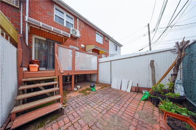 view of patio / terrace with fence and a wooden deck