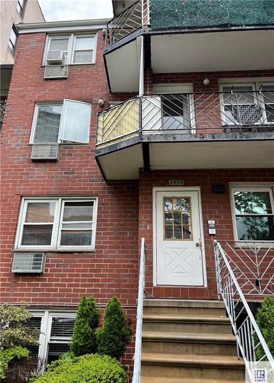 2959 Ocean Pkwy Unit 1F, Brooklyn, NY 11235 - property entrance with a balcony and brick siding
