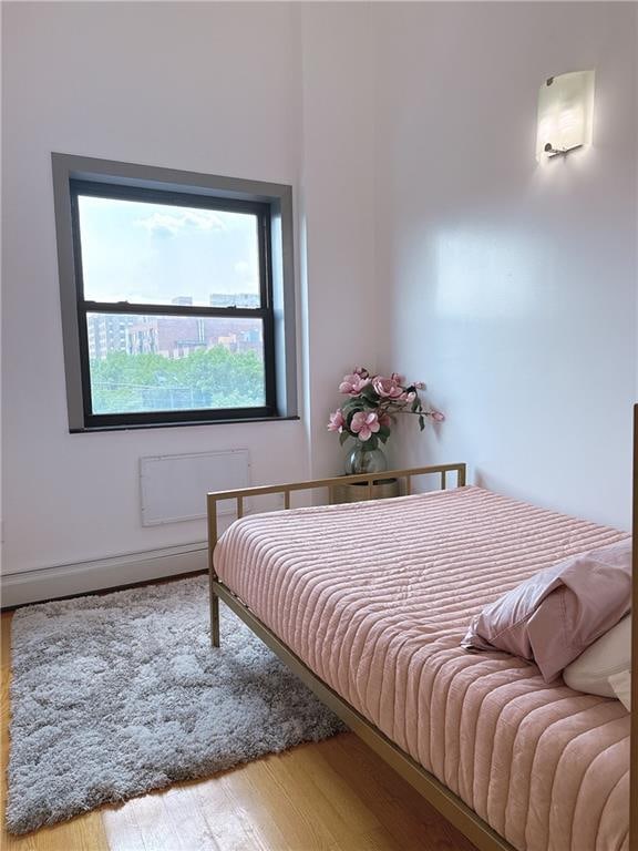 31-47 137th St Unit 4B, Brooklyn, NY 11354 - bedroom with wood finished floors