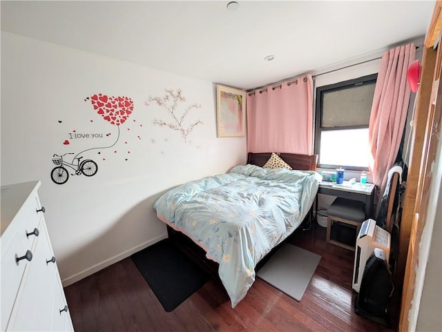 5418 3rd Ave Unit 3D, Brooklyn, NY 11220 - bedroom with dark wood finished floors, heating unit, and baseboards