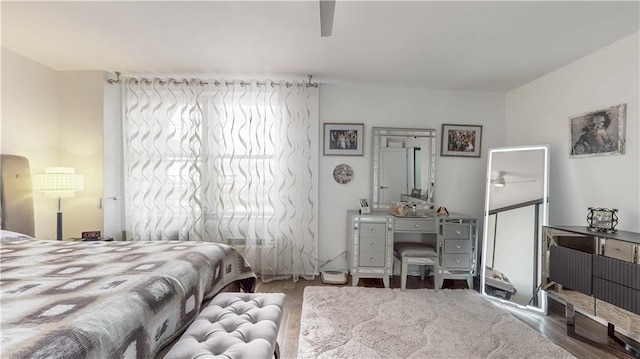 bedroom featuring wood finished floors