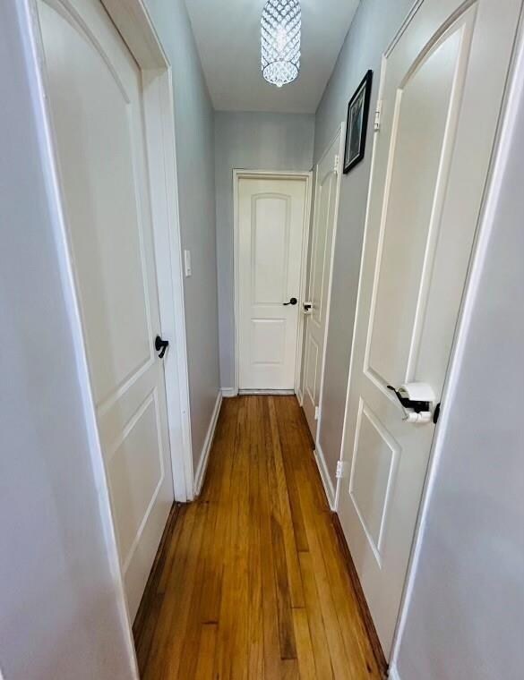 2807 Kings Hwy Unit 4C, Brooklyn, NY 11229 - hallway featuring hardwood / wood-style floors and baseboards