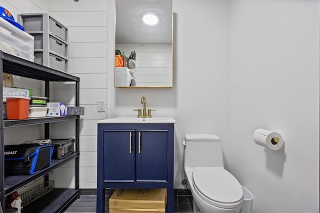 282 21st St Unit 2C, Brooklyn, NY 11215 - bathroom with toilet, vanity, and baseboards