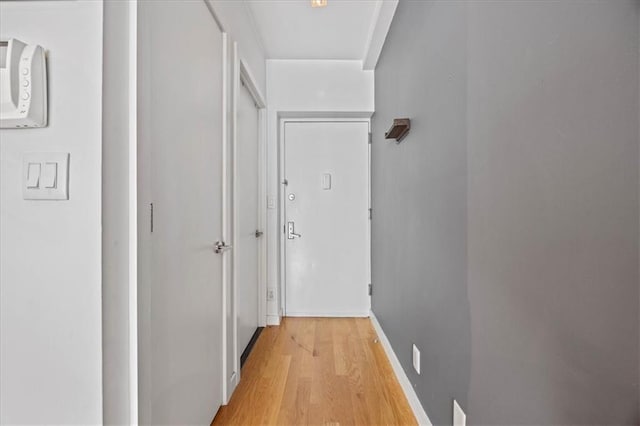 282 21st St Unit 2C, Brooklyn, NY 11215 - hallway featuring light wood-style floors and baseboards