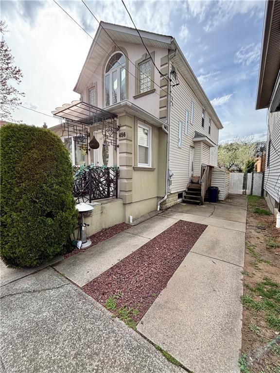 view of side of property with fence