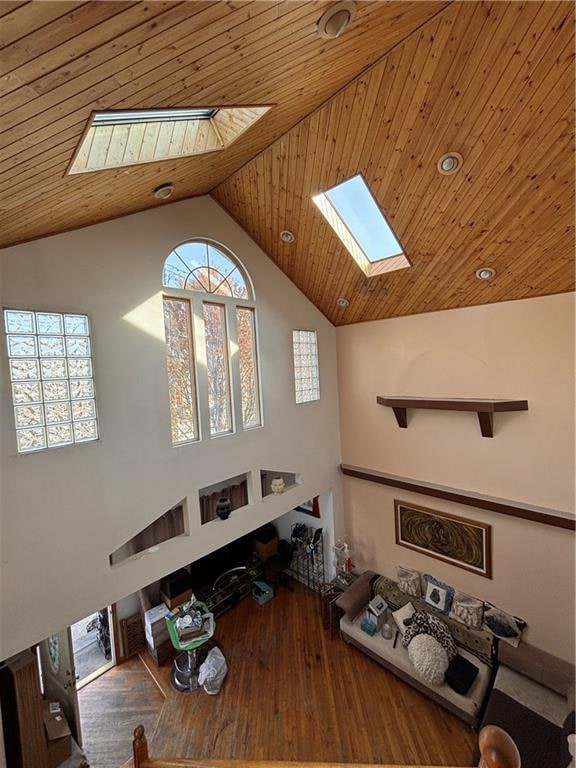 456 Oder Ave, Staten Island, NY 10304 - living area with a skylight, high vaulted ceiling, wood finished floors, and wood ceiling