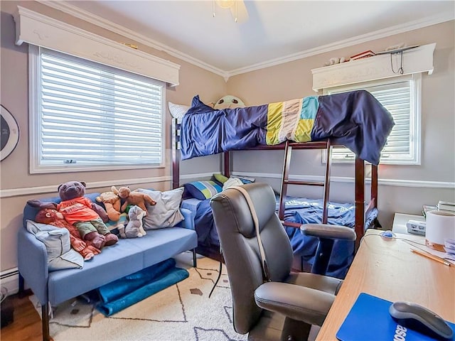 bedroom featuring ornamental molding and a ceiling fan