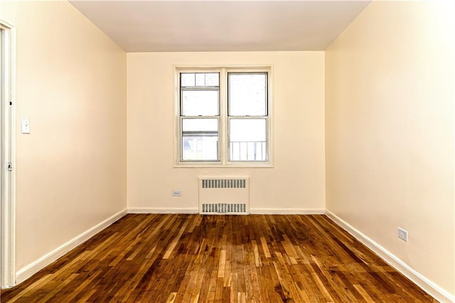 50 Kenilworth Pl Unit 5M, Brooklyn, NY 11210 - unfurnished room featuring radiator heating unit and wood-type flooring