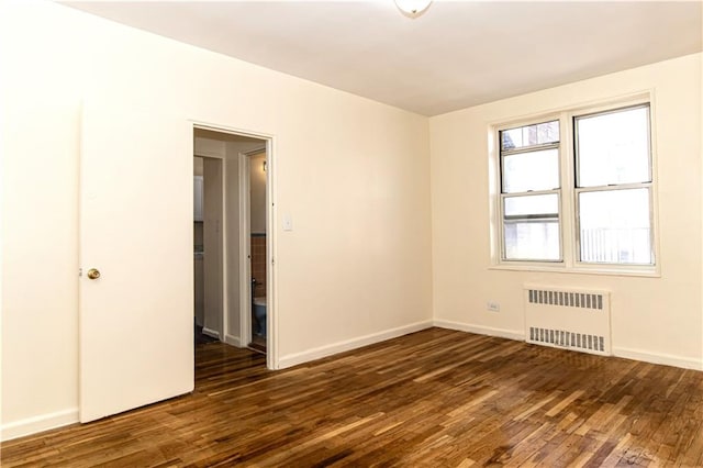 50 Kenilworth Pl Unit 5M, Brooklyn, NY 11210 - empty room featuring radiator heating unit and wood finished floors