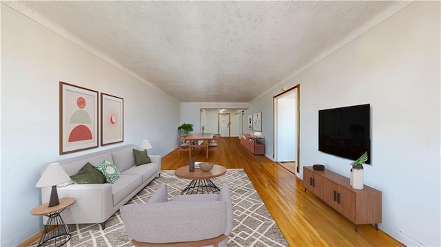 7401 Shore Rd Unit 6F, Brooklyn, NY 11209 - living room with a textured ceiling and light wood-type flooring