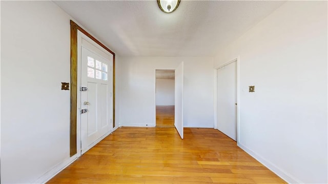 7401 Shore Rd Unit 6F, Brooklyn, NY 11209 - foyer featuring baseboards and light wood finished floors