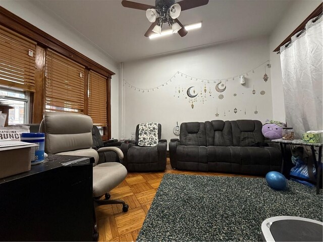 living room featuring ceiling fan