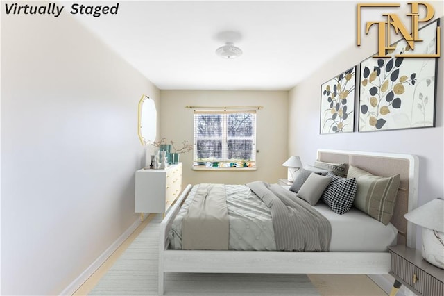 9526 Schenck St Unit 2, Brooklyn, NY 11236 - bedroom with baseboards and wood finished floors
