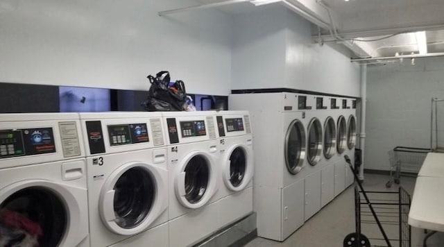 common laundry area with washer and clothes dryer